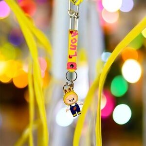 Cute Luck Character Keychain with Yellow Strap